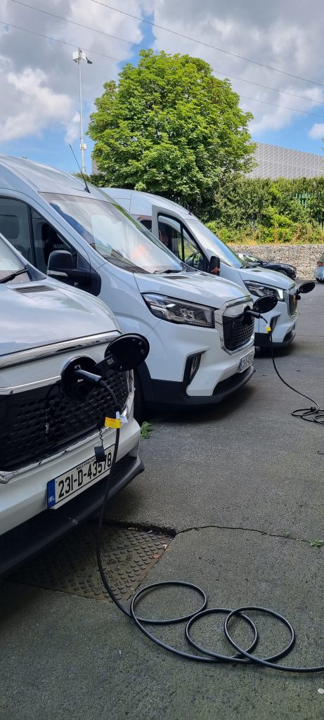 Some of the new electric fleet charging at the Dublin base.